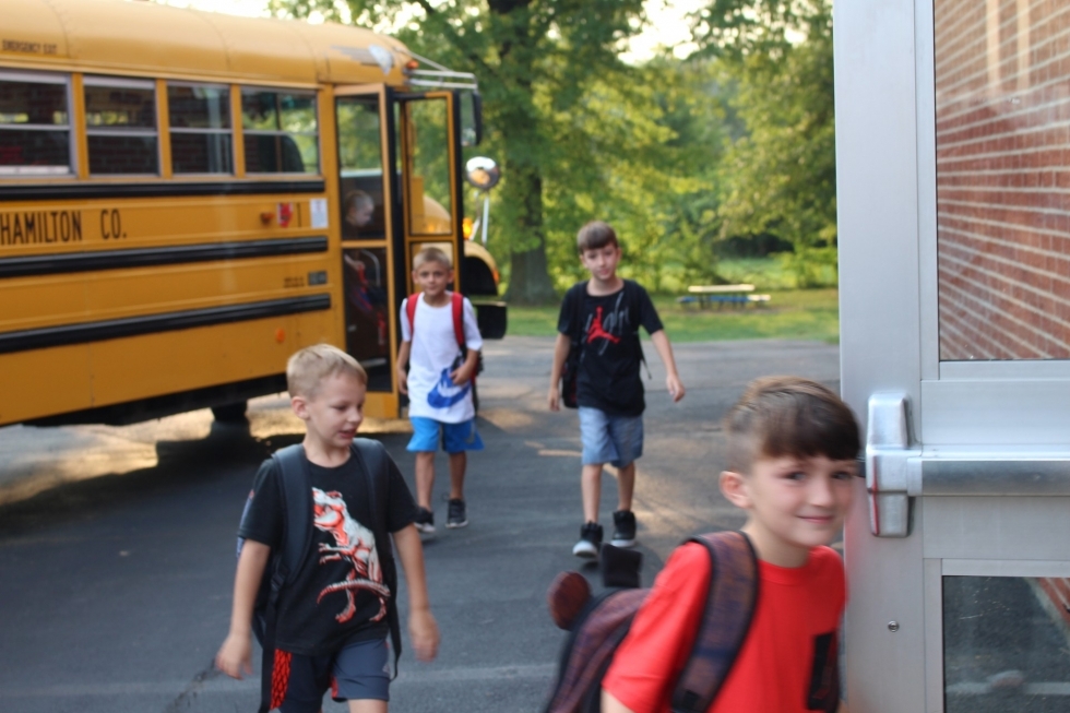 Kids getting off bus