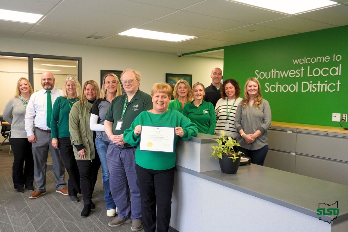 staff members with award